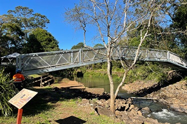 New silver footbridge spanning the Bangalow Weir.
