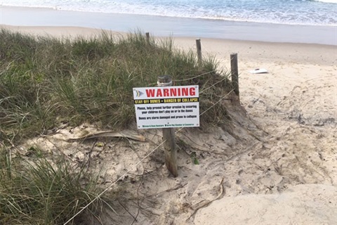 Dune erosion sign Suffolk Park beach