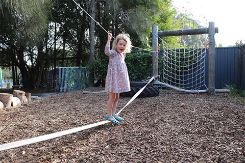 Photo-of-child-on-balancing-ropes-at-childcare-centre