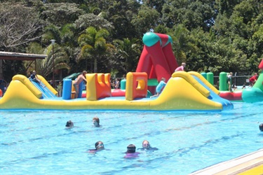 Inflatable obstacle course at Mullum pool