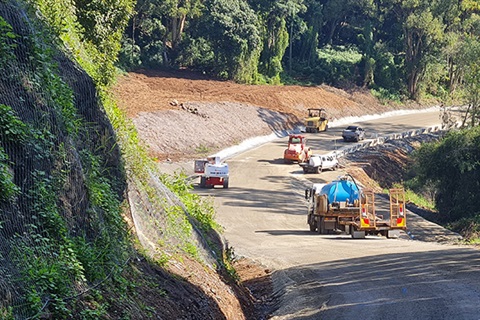 Heavy equipment working on road - Federal Drive 