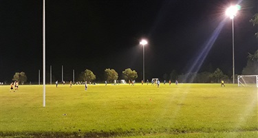 Soccer under lights on the South West Field.
