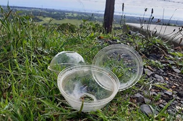 Plastic lids left on the road side
