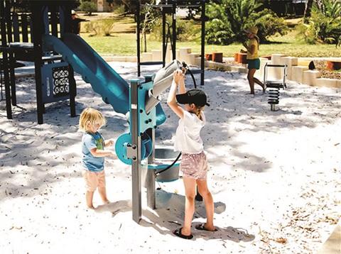 Children playing in a sand pit