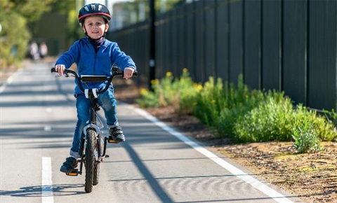 Child cycling on the Suffolk Park bike path