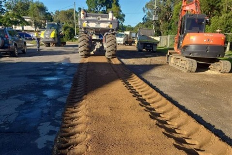 Machinary working on resealing a road.jpg